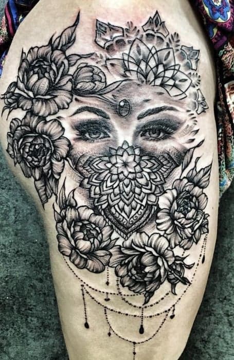 30 Ideas de tatuajes únicos que te encantarán 23 Tatuajes únicos en el muslo cara de mujer