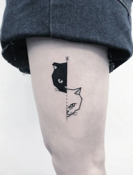 Tatuaje de gato blanco y negro