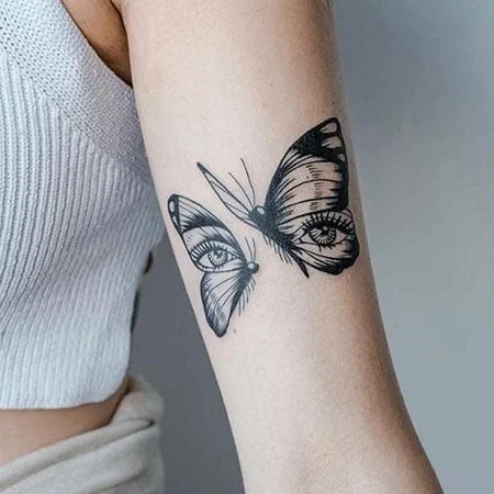 Tatuaje de mariposa con ojos para hombres