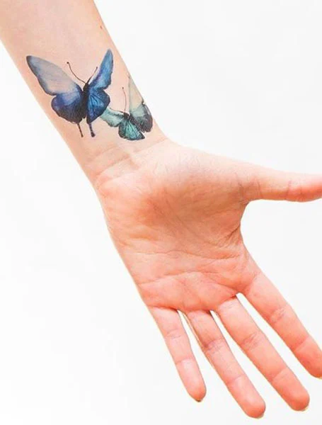 Tatuaje de muñeca de mariposa
