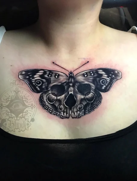 Tatuaje de calavera de mariposa