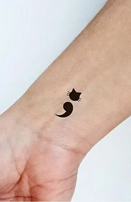 Tatuajes de punto y coma de gato