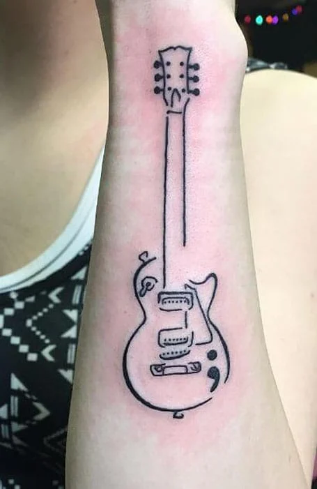 Tatuaje musical de punto y coma