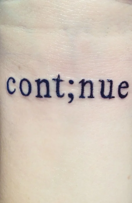 Tatuaje de conciencia sobre el suicidio