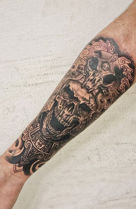 Tatuaje de calavera azteca