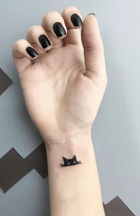 tatuaje de gato solo los ojos